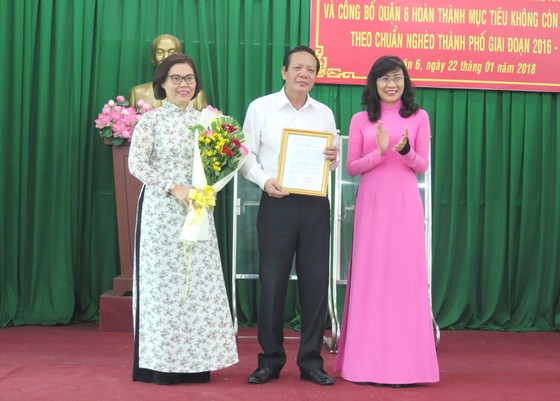 Công bố quận đầu tiên không còn hộ nghèo theo chuẩn TPHCM ảnh 1