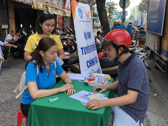 TPHCM ra quân vận động 60.000 người tham gia BHYT ảnh 2