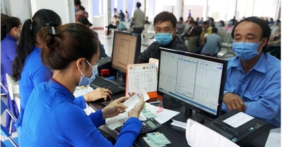 Đề nghị hoàn tiền vé tàu xe cho những người ở lại ăn tết ảnh 1