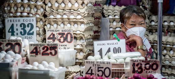 An egg vendor sits in her stall in Quiapo, Philippines.