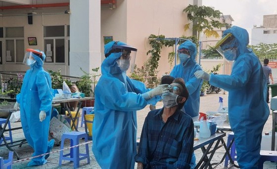 TPHCM ghi nhận 667 người nhiễm Covid-19 chỉ trong 1 ngày ảnh 3