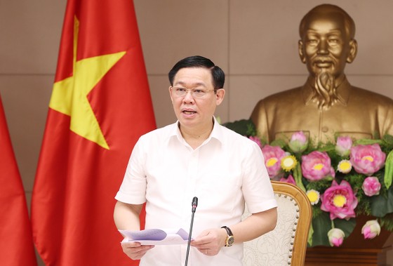 Kiểm soát lạm phát theo mục tiêu đề ra ảnh 1