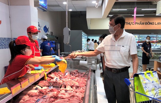 Doanh nghiệp thực phẩm duy trì sản xuất ổn định ảnh 1