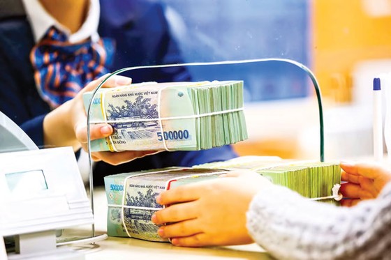 Kiểm soát chặt tín dụng vào bất động sản ảnh 1