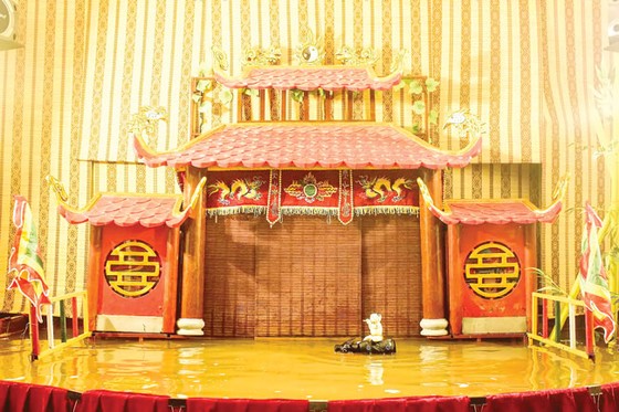 Gánh rối một nghệ sĩ ảnh 2