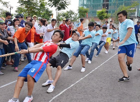 Công nhân TPHCM sống ra sao? - Bài 4: Nỗ lực đảm bảo đời sống công nhân ảnh 1