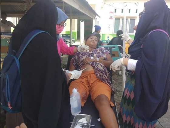 Số nạn nhân thiệt mạng do động đất và sóng thần tại Indonesia đã lên tới gần 400 người ảnh 20