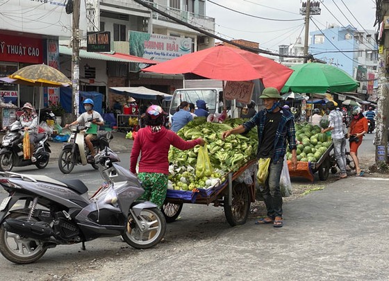 Những hình ảnh toàn dân phòng chống dịch tại Hà Nội và TPHCM ảnh 23