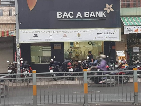 Khởi tố, bắt tạm giam thanh niên dùng súng cướp ngân hàng Bắc Á ảnh 1