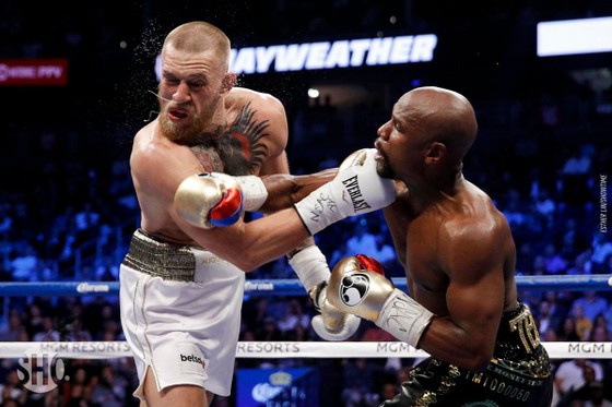 Đấu trường UFC: “Độc cô cầu bại” muốn tái ngộ “Gã Ailen láo xược” trong lồng bát giác ảnh 1