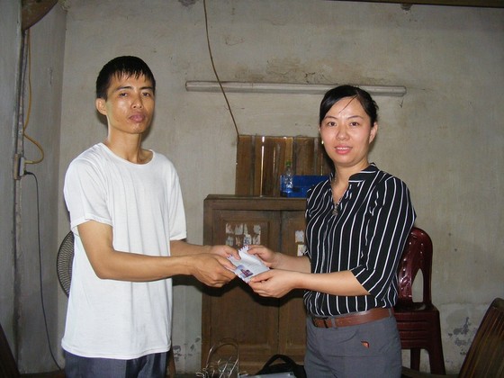 Báo SGGP trao tiền hỗ trợ 3 bố con bị bệnh tan máu bẩm sinh tại Nghệ An ảnh 1