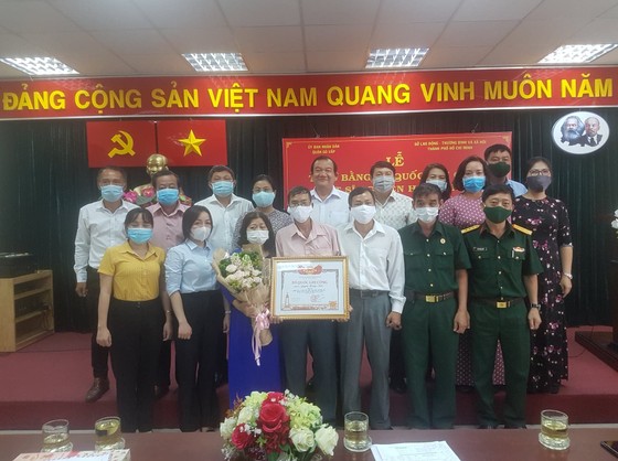 Cấp bằng Tổ quốc ghi công cho liệt sĩ 'hiệp sĩ' Nguyễn Hoàng Nam ảnh 7