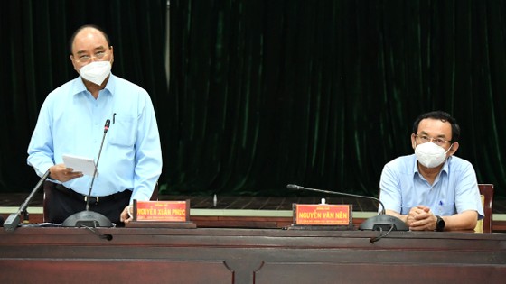 Chủ tịch nước Nguyễn Xuân Phúc đồng ý chủ trương giãn cách tại TPHCM thêm một thời gian nữa ảnh 2