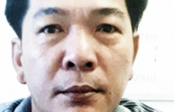 Bắt đối tượng khóa cửa, đổ xăng đốt nhà khiến 4 người bị bỏng nặng ảnh 1
