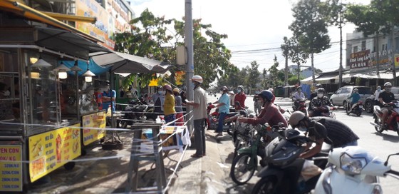 Long An áp dụng 'Thẻ xanh' và 'Thẻ vàng' Covid thay giấy đi đường ảnh 1
