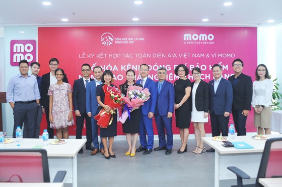 Ví MoMo và AIA hợp tác toàn diện và triển khai kênh thanh toán chiến lược ảnh 1