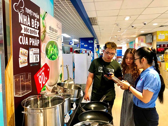 Lợi ích kép từ “Tích tem đổi quà” ảnh 1