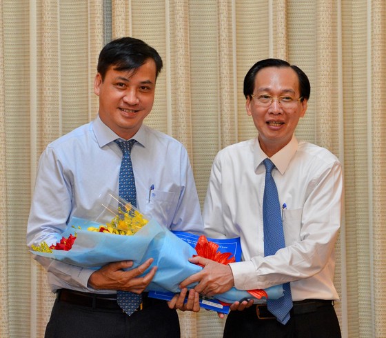 Chủ tịch UBND quận 7 Lê Hòa Bình làm Giám đốc Sở Xây dựng TPHCM ảnh 1