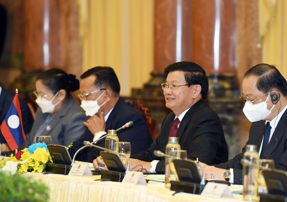 Chủ tịch nước Nguyễn Xuân Phúc hội kiến với Tổng Bí thư, Chủ tịch nước Lào Thongloun Sisoulith ảnh 4