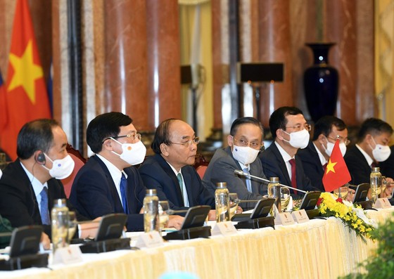 Chủ tịch nước Nguyễn Xuân Phúc hội kiến với Tổng Bí thư, Chủ tịch nước Lào Thongloun Sisoulith ảnh 3