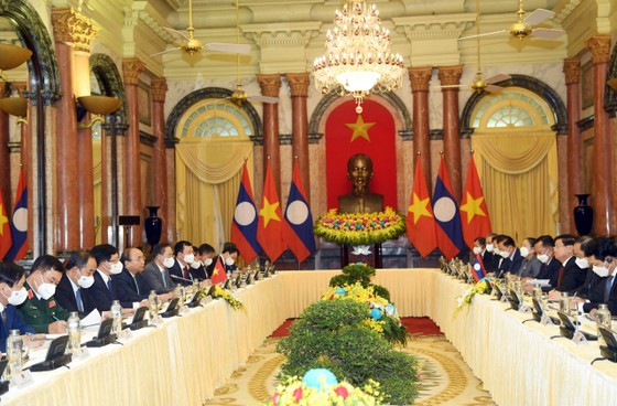 Chủ tịch nước Nguyễn Xuân Phúc hội kiến với Tổng Bí thư, Chủ tịch nước Lào Thongloun Sisoulith ảnh 2