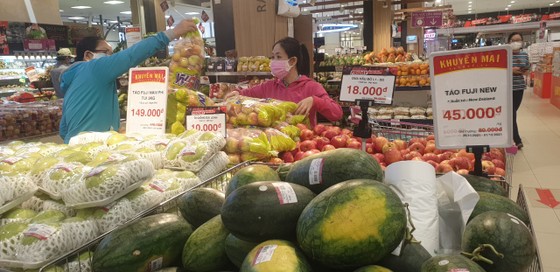 TPHCM: Doanh nghiệp đồng loạt khuyến mại, sức mua tăng nhẹ ảnh 2