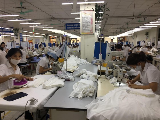 Việt Nam đã xuất hơn 415 triệu khẩu trang cho thế giới ảnh 1