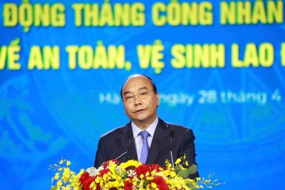 Chủ tịch nước Nguyễn Xuân Phúc: Tập trung giải quyết những vấn đề người lao động đang bức xúc ảnh 3