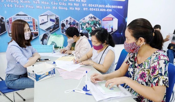 Đã chi hơn 30.000 tỷ đồng từ Quỹ Bảo hiểm thất nghiệp hỗ trợ người dân ảnh hưởng dịch Covid-19 ảnh 1