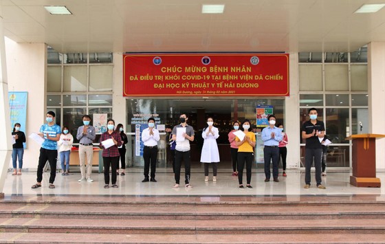 Thêm 30 bệnh nhân Covid-19 khỏi bệnh ảnh 1