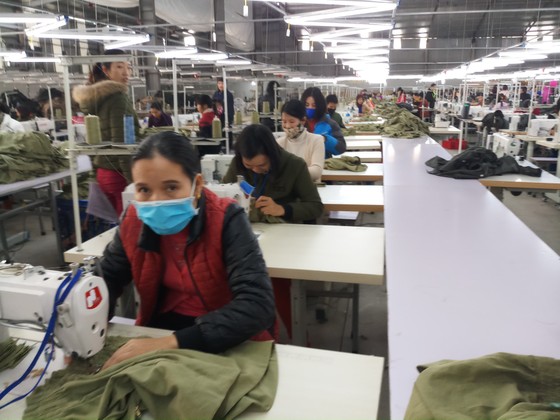 Lãnh đạo công ty cam kết trả lương, công nhân trở lại làm việc ảnh 1