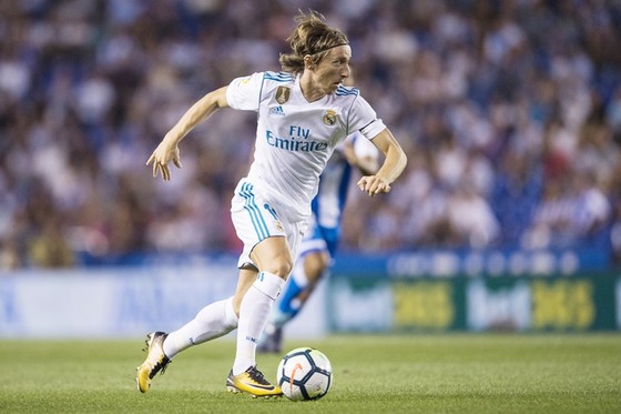 Modric cần thách thức lớn hơn mới rời Tottenham. Ảnh: Getty Images