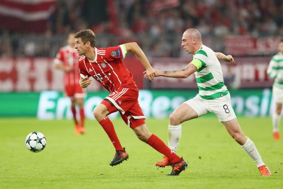 Thomas Mueller (trái) đã tìm lại được niềm vui trong thi đấu dưới sự dẫn dắt của HLV Jupp Heynckes. Ảnh: Getty Images    