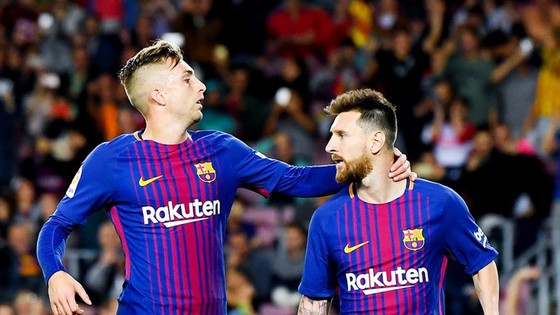 Deulofeu (trái) không còn sát cánh với Messi khi đã chuyển đến Watford. Ảnh: Getty Images