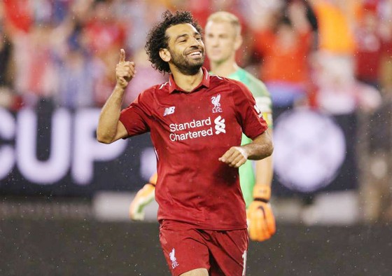 Mohamed Salah mừng bàn thắng trong ngày đầu trở lại đội hình Liverpool. Ảnh: Reuters