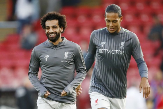 Trung vệ Virgil Van Dijk (phải) và Mohamed Salah trên tuyến đầu đang làm nên sức mạnh của Liverpool. Ảnh: Getty Images