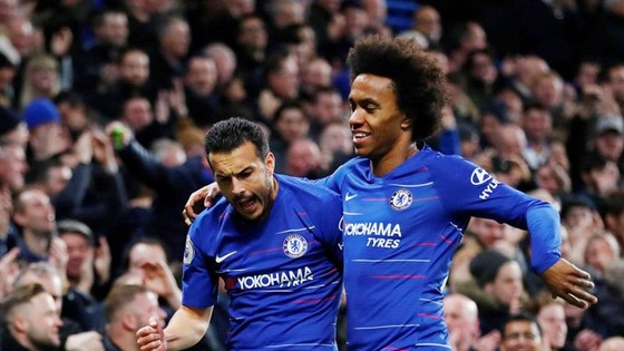 Willian (phải) và Pedro cùng lập công giúp Chelsea chiến thắng Newcastle. Ảnh: Getty Images    
