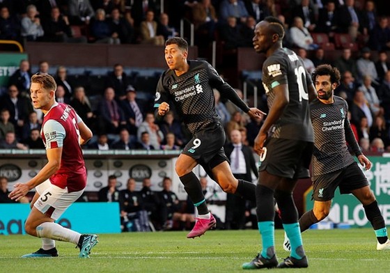 Roberto Firmino giúp Liverpool hoàn tất nhiến thắng và bản thân thiết lập mốc quan trọng. Ảnh: Getty Images    