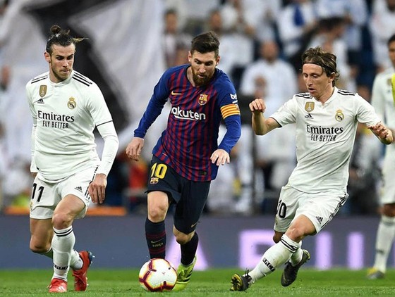 Lionel Messi đã bị các ngôi sao Real Madrid phong tỏa. Ảnh: Getty Images