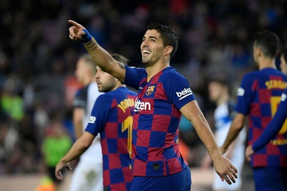 Luis Suarez tin năng lực ghi bàn tốt sẽ giúp anh có được hợp đồng mới. Ảnh: Getty Images    