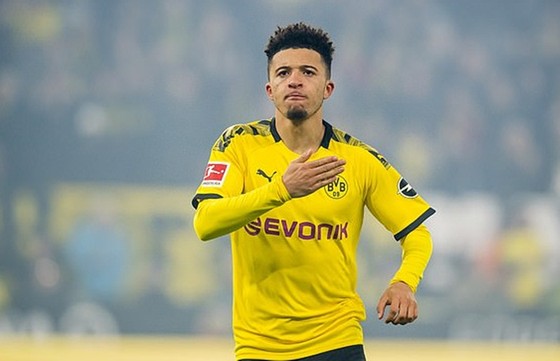Jadon Sancho sẽ không vấn đề gì nếu ở lại với Borussia Dortmund. Ảnh: Getty Images