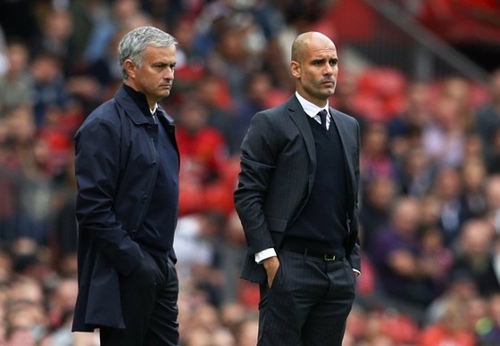 Pep Guardiola không muốn tiếp tục những màn khẩu chiến với Jose Mourinho. Ảnh: Getty Images  