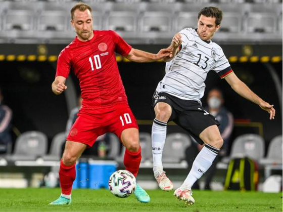 Tuyển Đức (phải) và Đan Mạch hòa 1-1 trong trận giao hữu. Ảnh: Getty Images