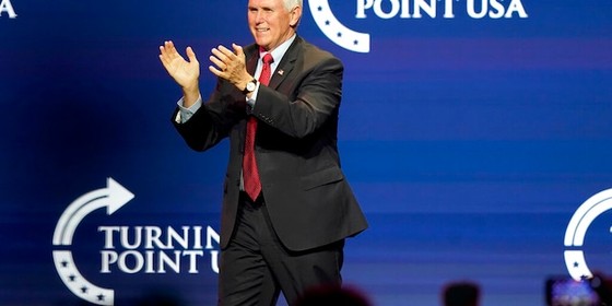 Vice President Mike Pence arrives on the stage before speaking at the Turning Point USA Student Action Summit, Tuesday, Dec. 22, 2020, in West Palm Beach, Fla. (AP Photo/Lynne Sladky)