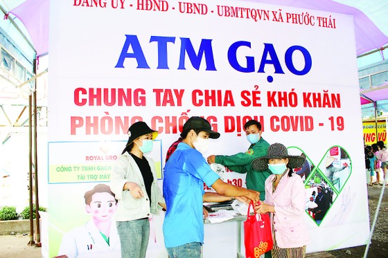 Vedan Việt Nam chung tay nhân rộng mô hình ATM gạo hỗ trợ đồng bào bị ảnh hưởng bởi dịch bệnh Covid-19 ảnh 1
