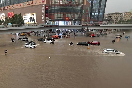 Trung Quốc nâng cảnh báo lũ lụt lên gần mức cao nhất ảnh 4