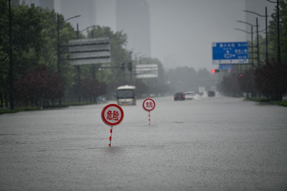 Trung Quốc nâng cảnh báo lũ lụt lên gần mức cao nhất ảnh 5