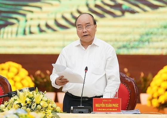 Thủ tướng Nguyễn Xuân Phúc phát biểu kết luận cuộc làm việc - Ảnh: VGP/Quang Hiếu