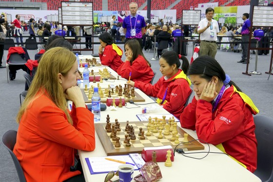 Nữ Việt Nam (phải) trong trận  thắng Thổ Nhĩ Kỳ  3-1 tại Olympiad 2016