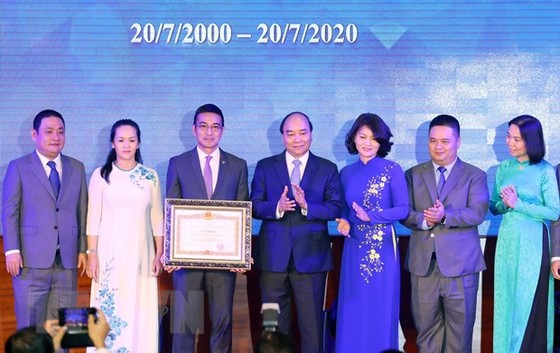 Thủ tướng đánh cồng kỷ niệm 20 năm hoạt động thị trường chứng khoán hình ảnh 1 Thu tuong danh cong ky niem 20 nam hoat dong thi truong chung khoan hinh anh 1